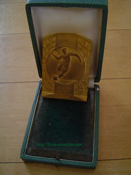 #6: Médaille Champion